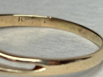 Solid 10k gold ring with "10k" stamp.
