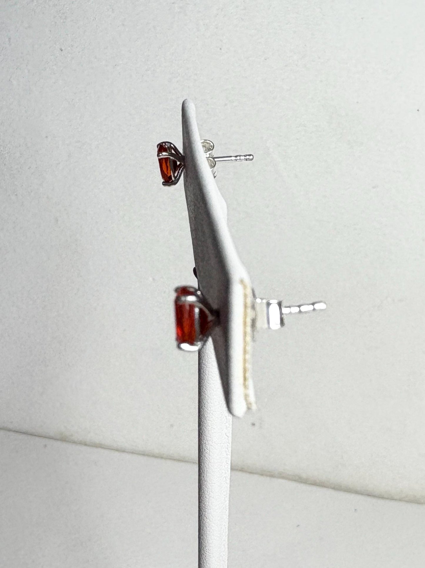 Sterling silver stud earrings with 6x4mm oval Mexican fire opals.