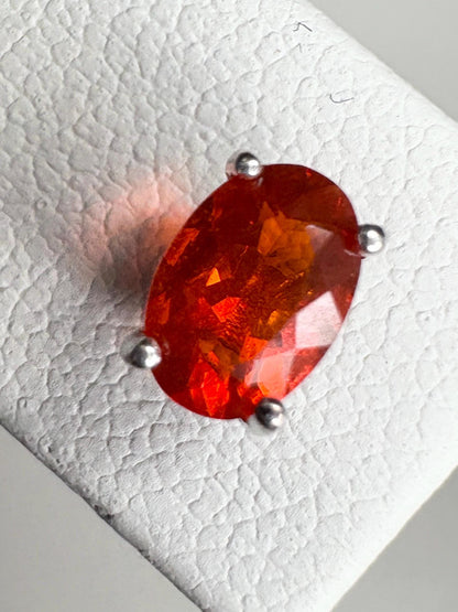 Oval Mexican fire opal solitaire stud earrings in sterling silver.