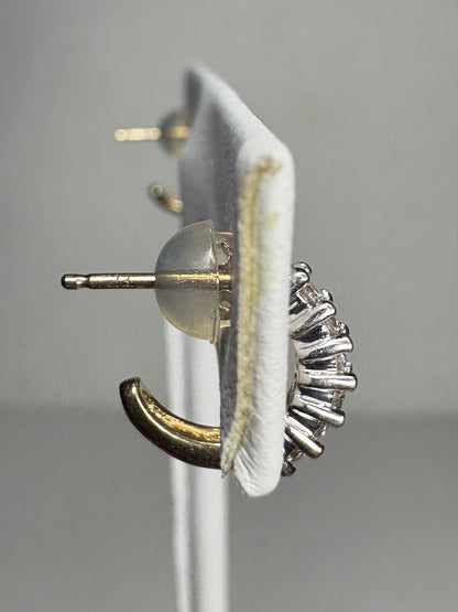 Tiny 14k gold partial hoop stud earrings with natural diamonds.