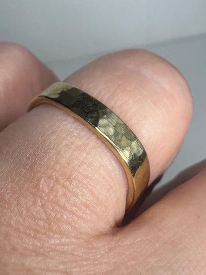 Solid 18k yellow gold hammered finish square band ring.