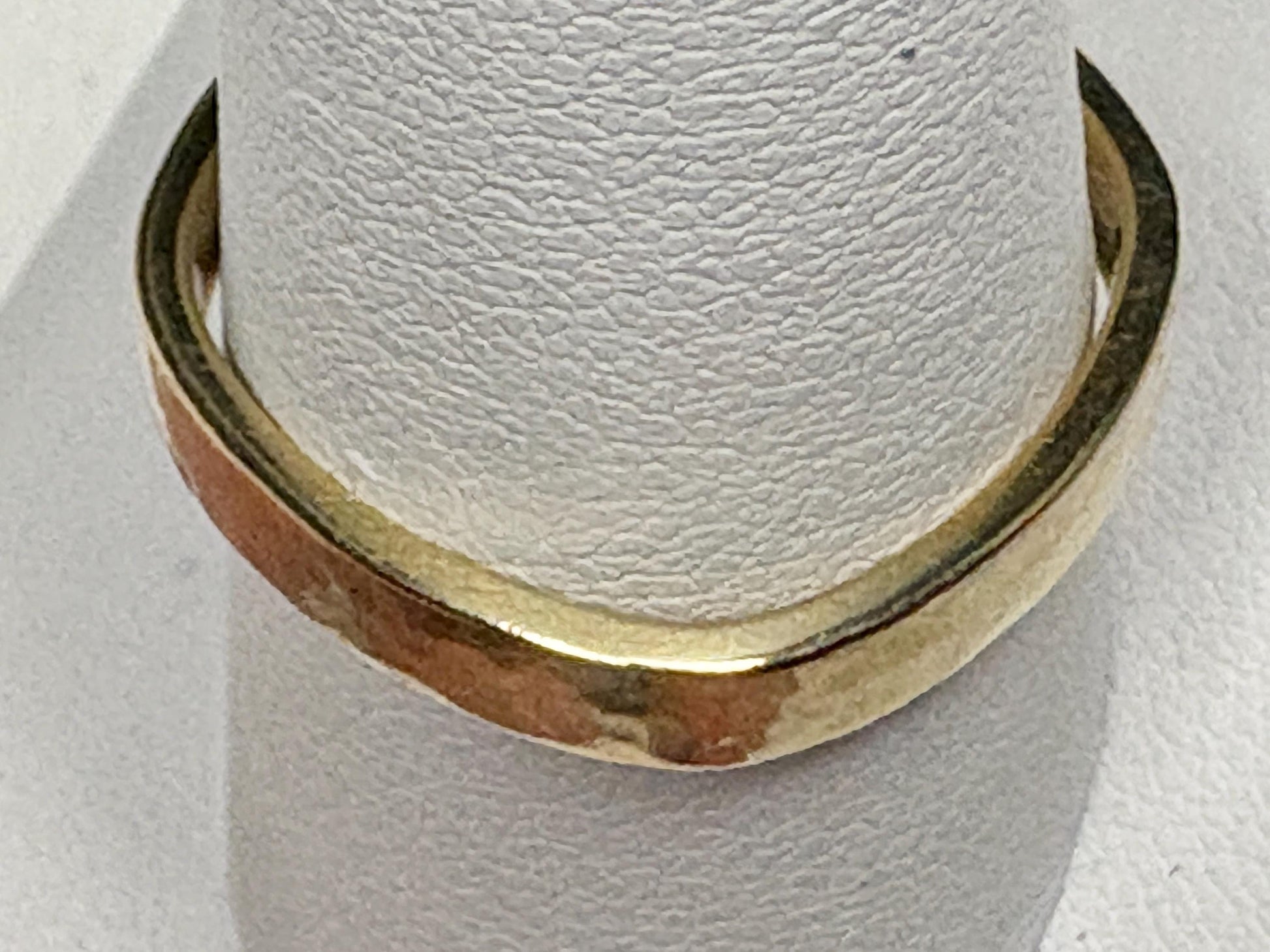 Solid 18k yellow gold hammered finish square band ring.