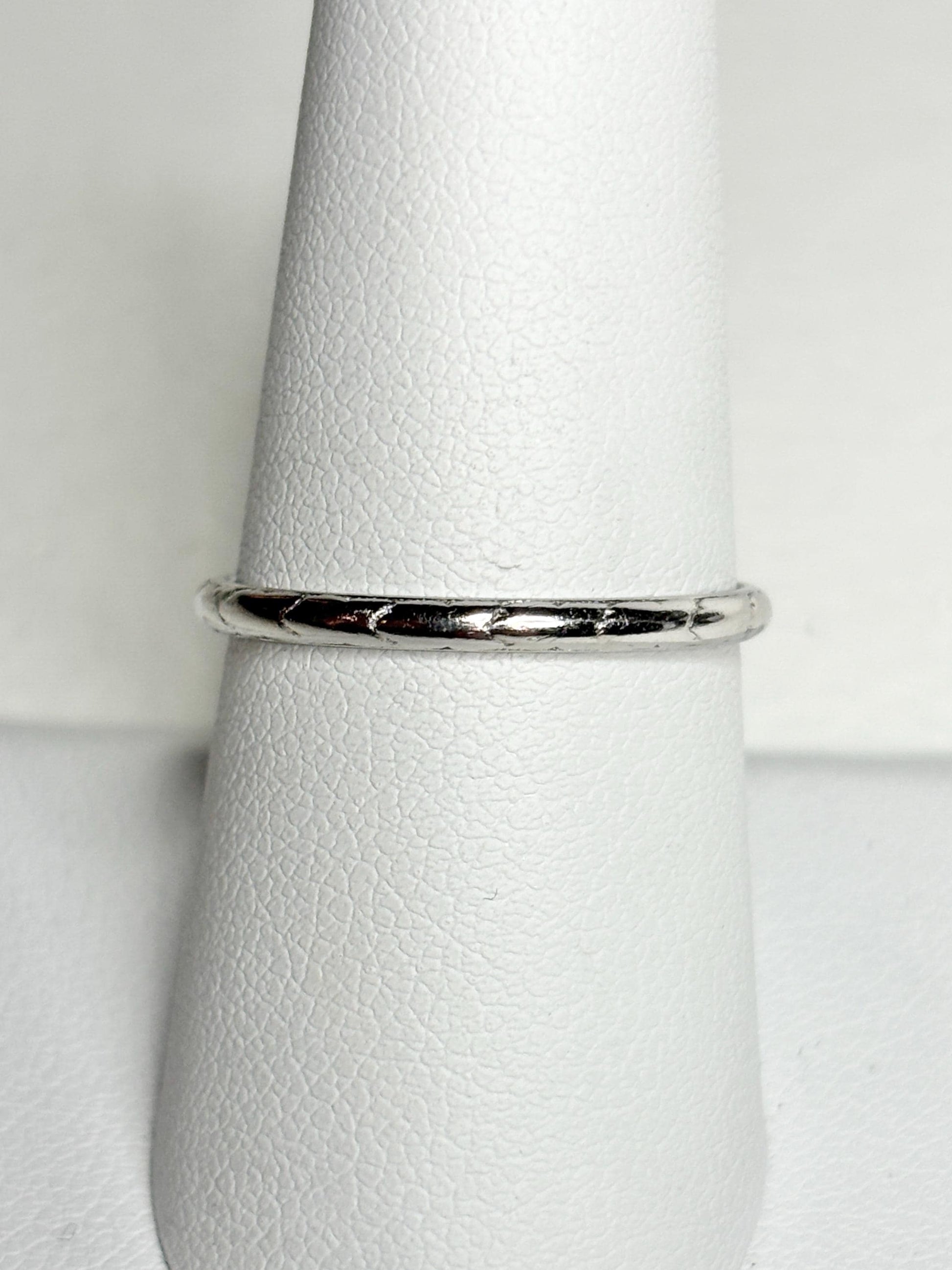 Art Deco platinum iridium stackable chevron thin band ring.