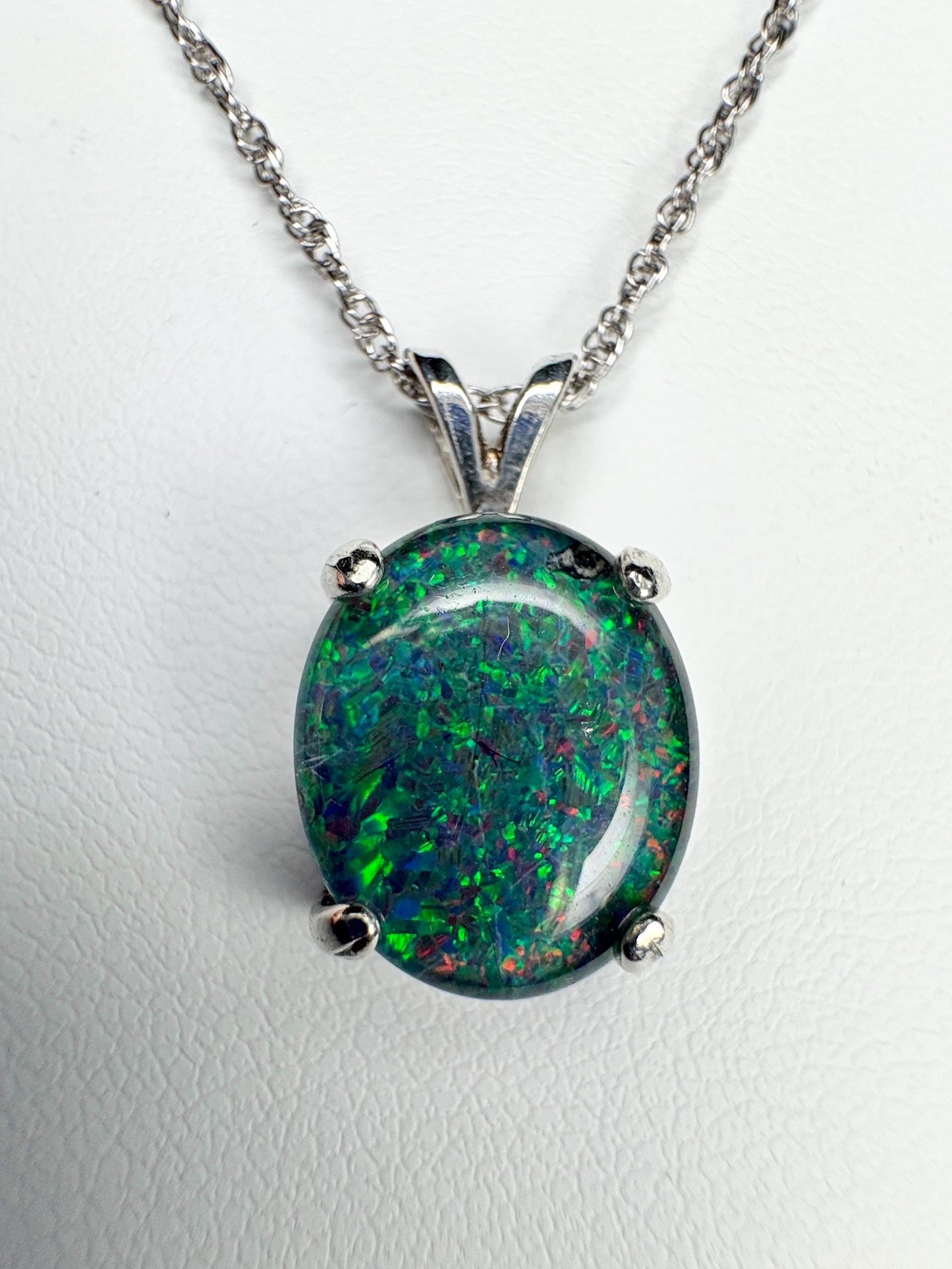 Sterling silver pendant necklace with an oval Australian opal triplet.