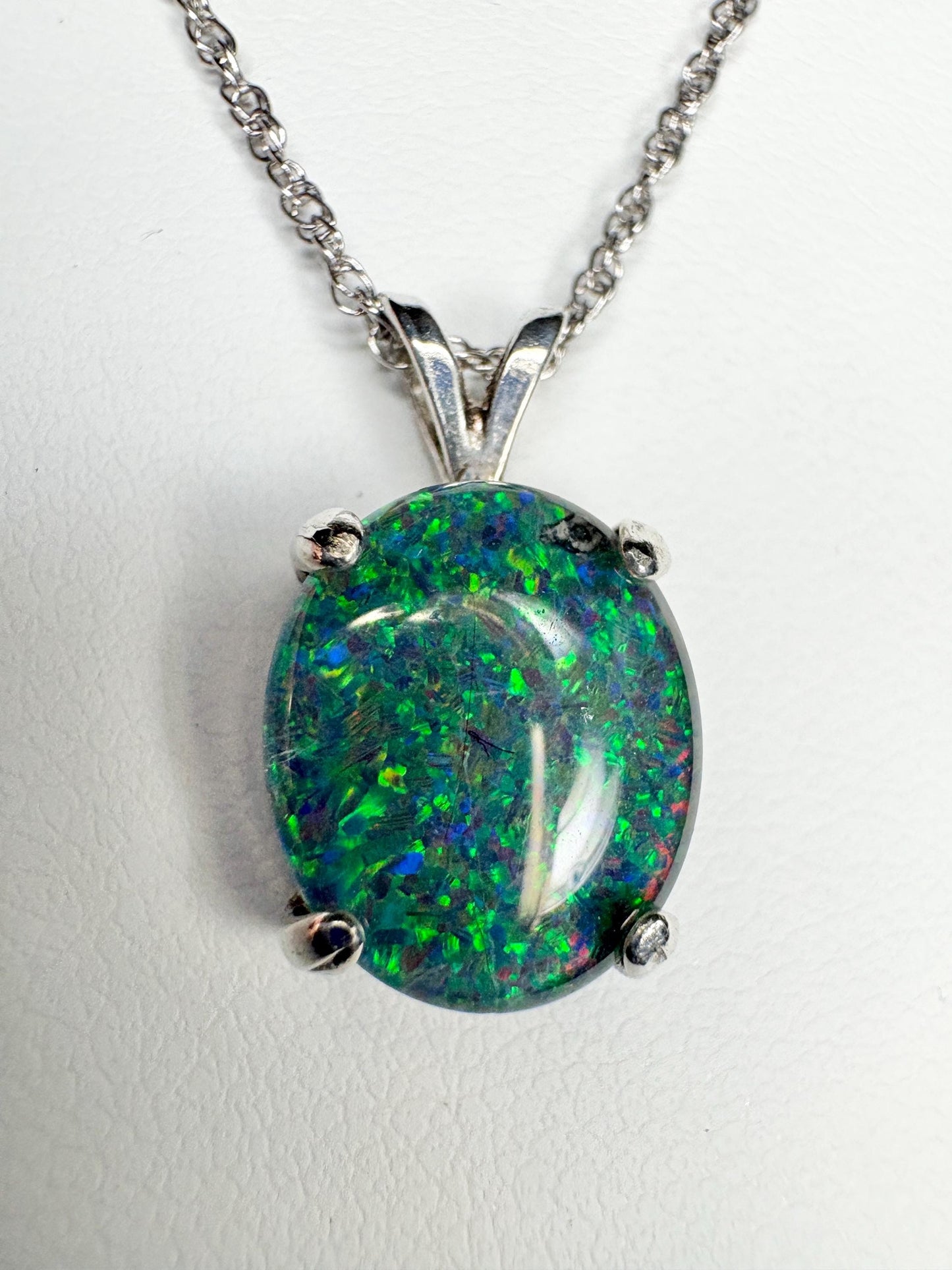 Sterling silver pendant necklace with an oval Australian opal triplet.