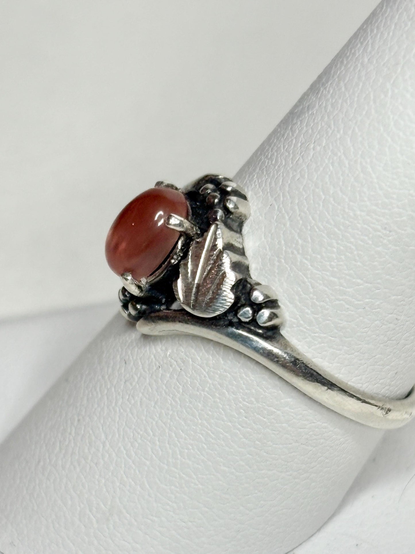 Vintage sterling silver ring with a bicolor Oregon sunstone cabochon.