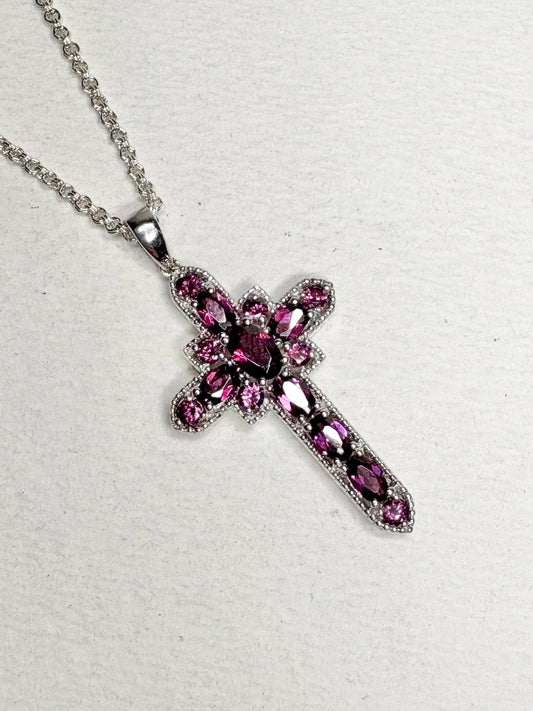 Sterling silver cross pendant necklace with rhodolite garnets.