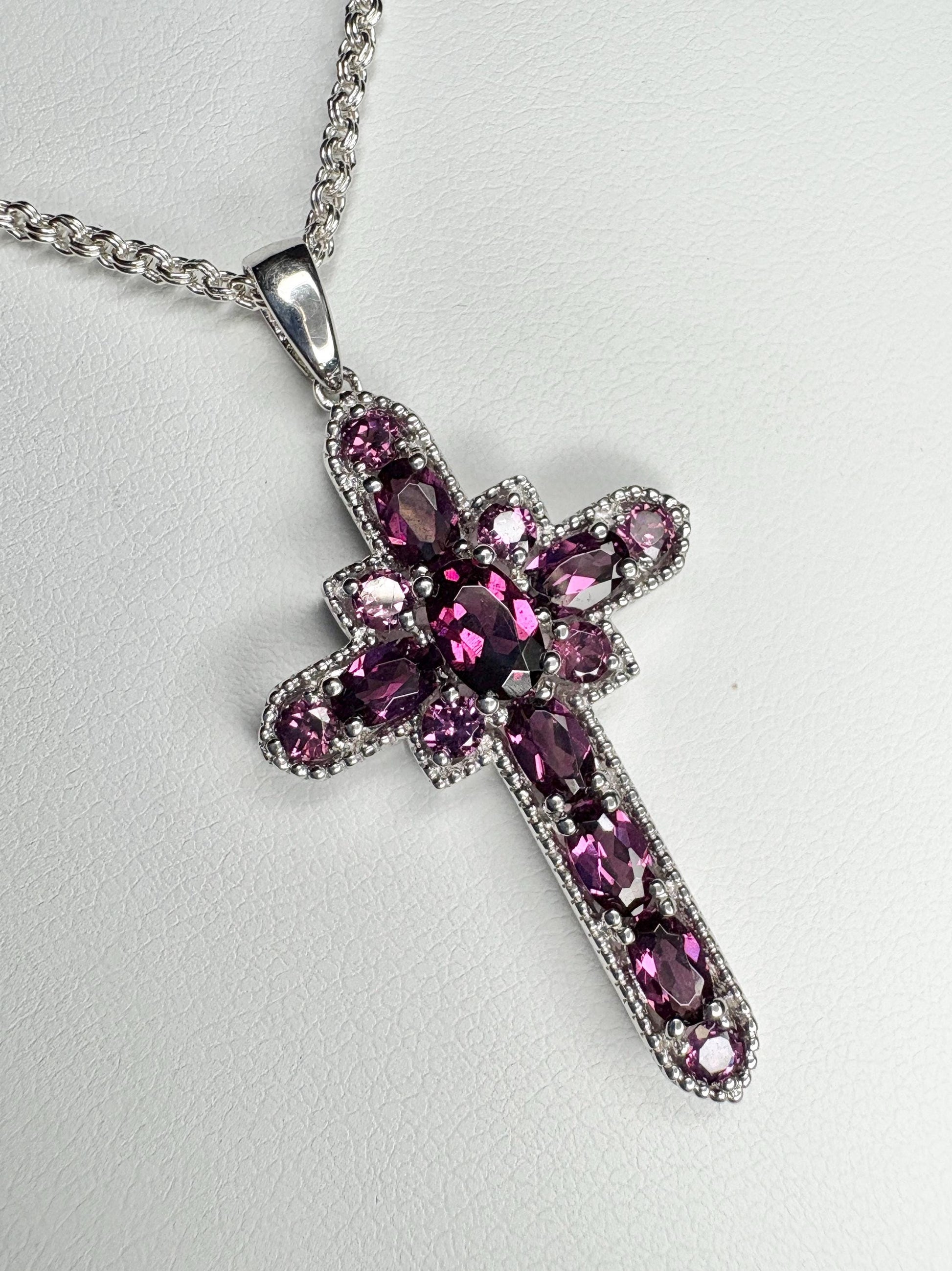 Sterling silver cross pendant necklace with rhodolite garnets.
