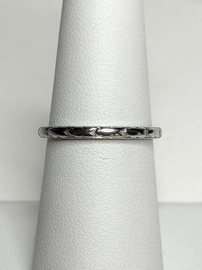 Retro 18k white gold chevron pattern band ring with small diamonds.