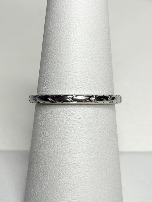 Retro 18k white gold chevron pattern band ring with small diamonds.