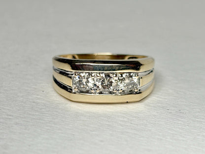 Men's 14k gold band ring with three champagne diamonds.