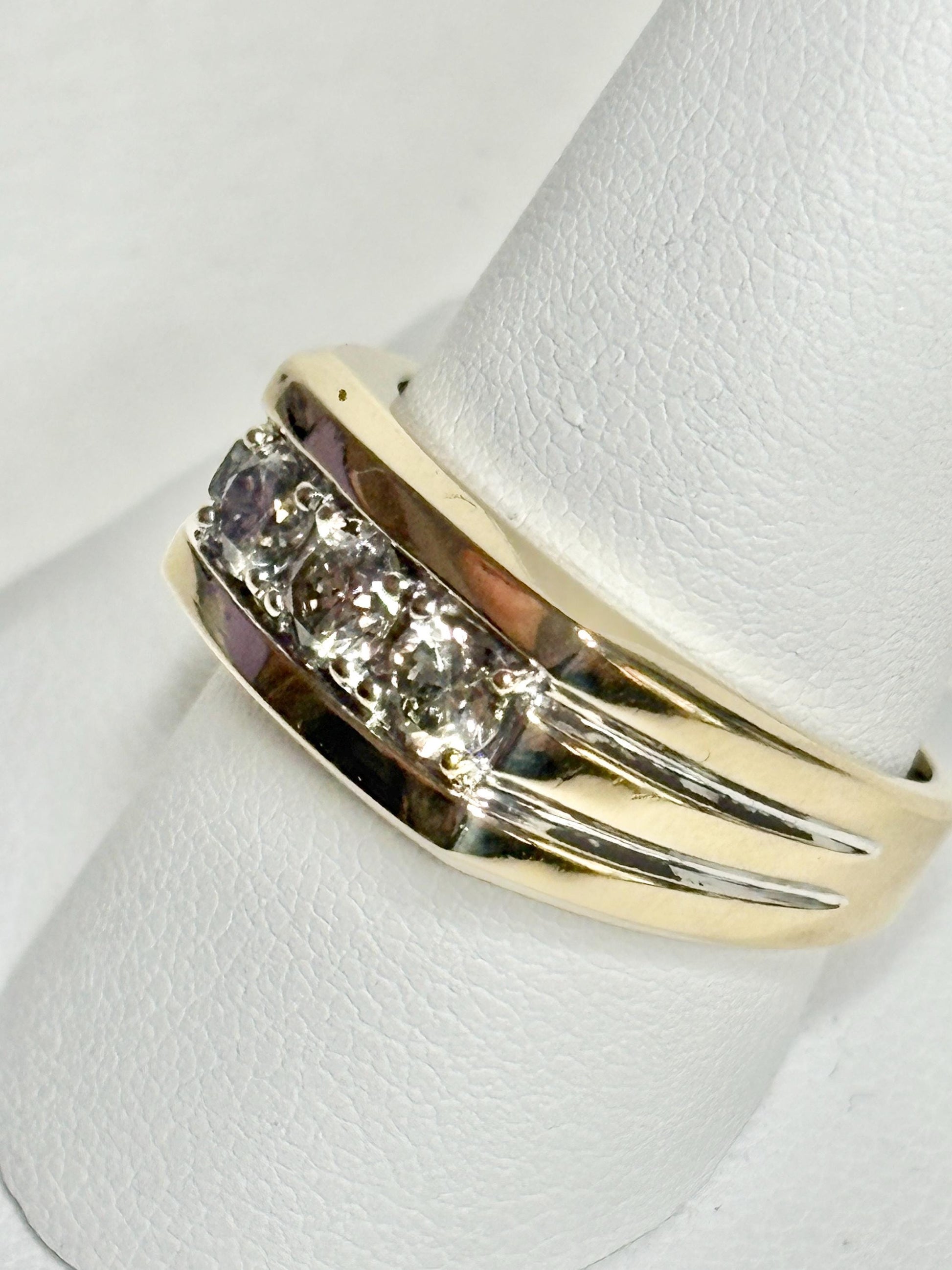 Men's 14k gold band ring with three champagne diamonds.