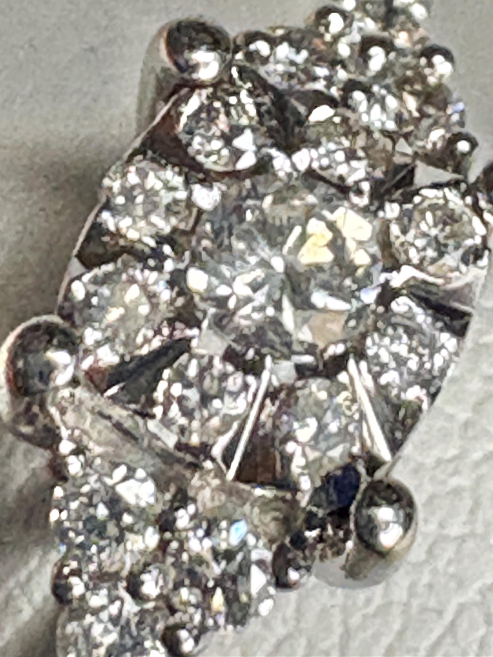 Squared diamond halo cluster ring in solid 14k white gold.