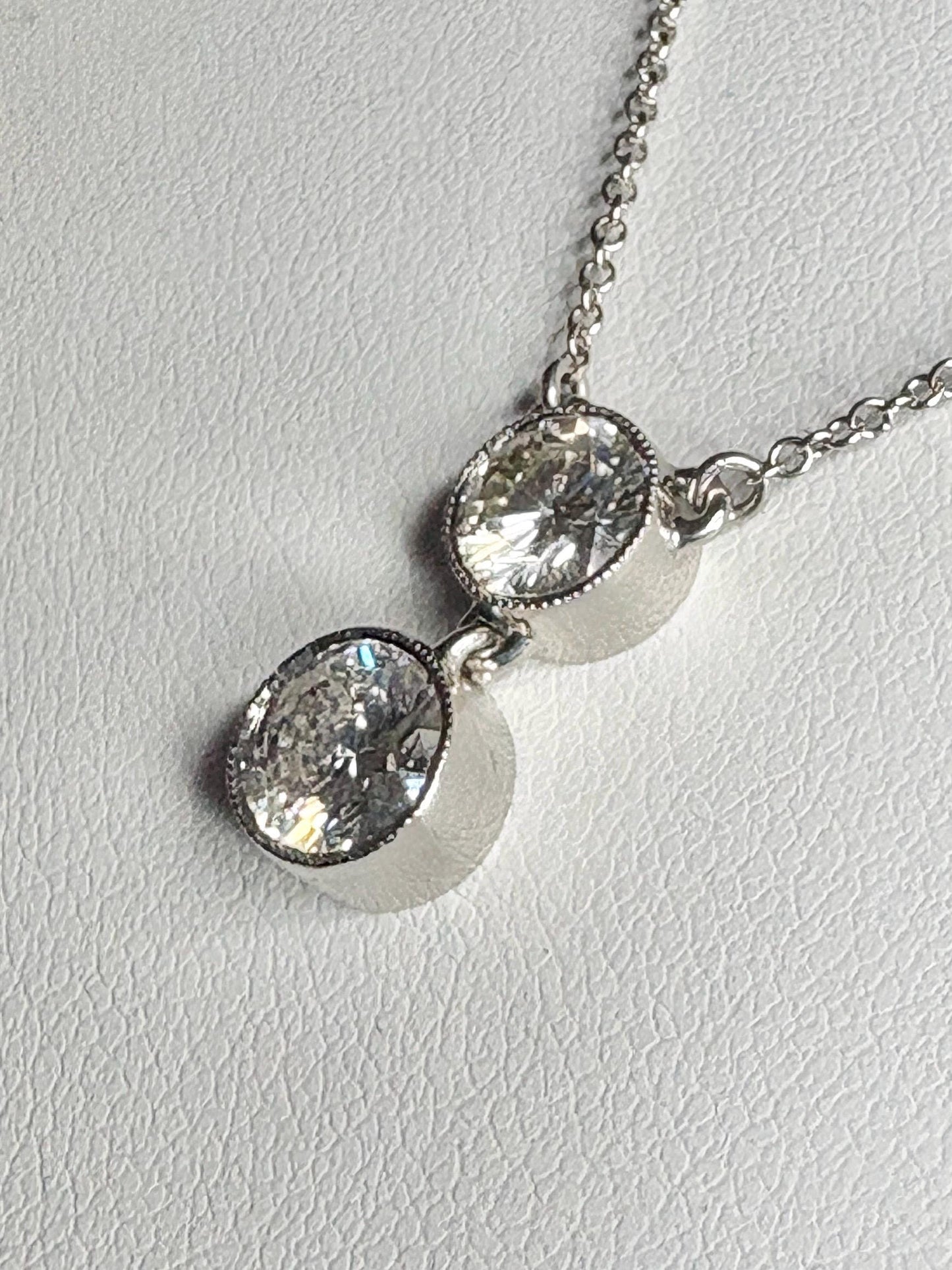 Custom double solitaire natural diamond necklace in 14k white gold.