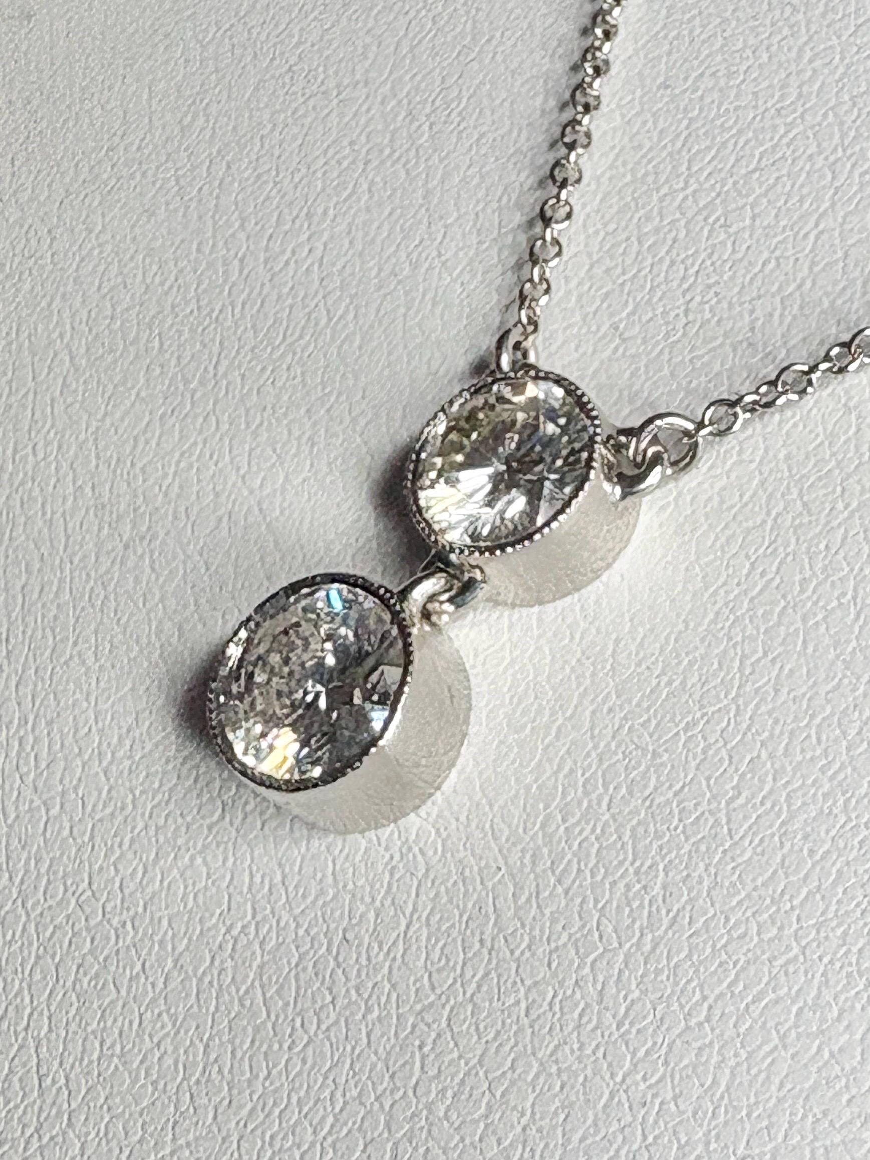 Custom double solitaire natural diamond necklace in 14k white gold.