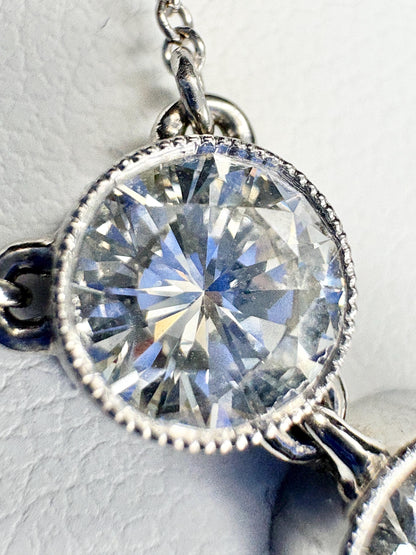 Custom double solitaire natural diamond necklace in 14k white gold.