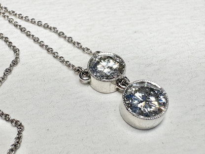 Custom double solitaire natural diamond necklace in solid 14k white gold.