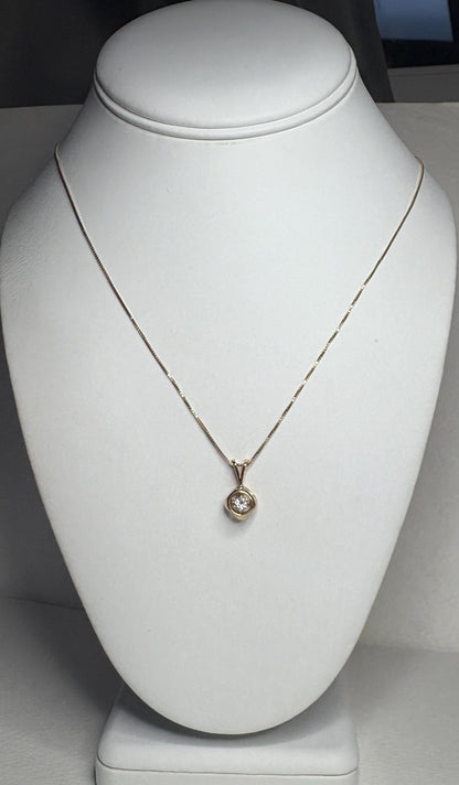 Vintage 14k gold solitaire diamond pendant necklace on a 20" box chain.