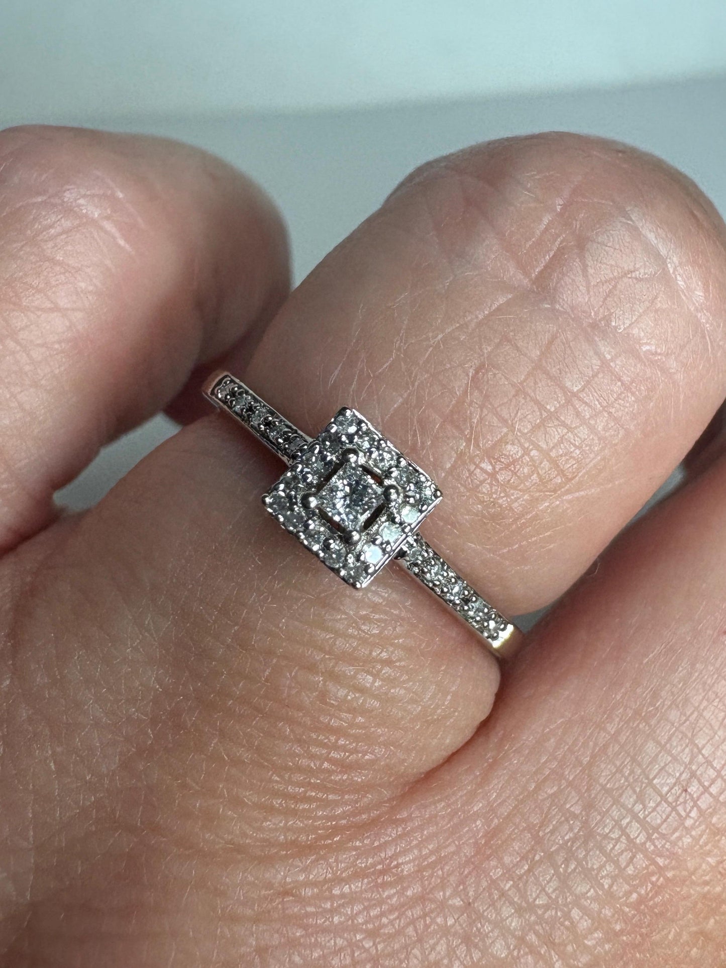 Princess cut diamond ring in 10k white gold.