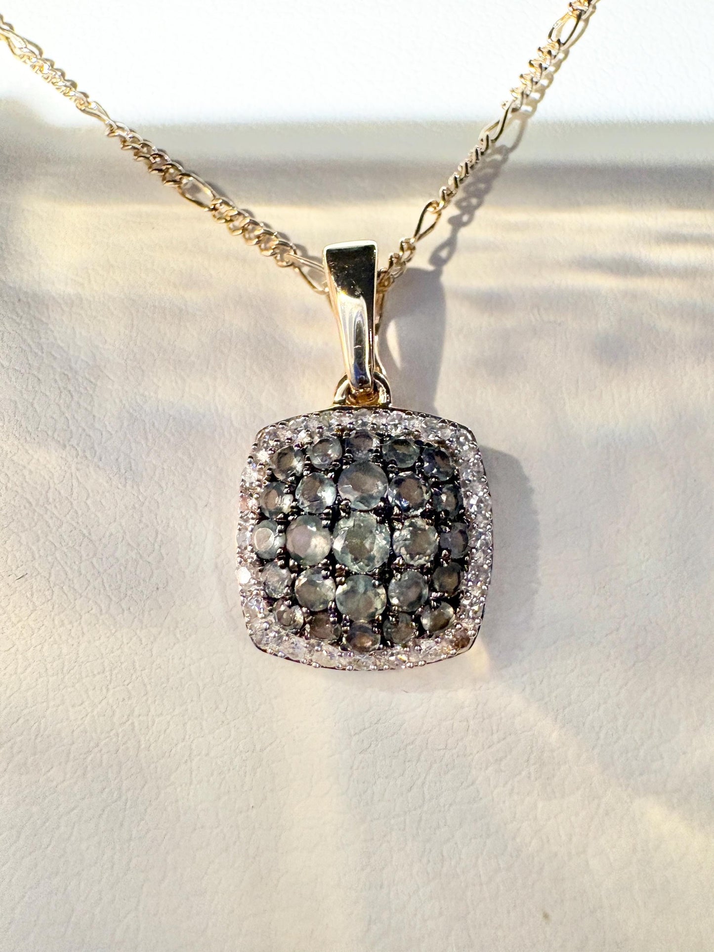 14k gold figaro necklace with a cushion cluster halo pendant of alexandrite and diamonds.