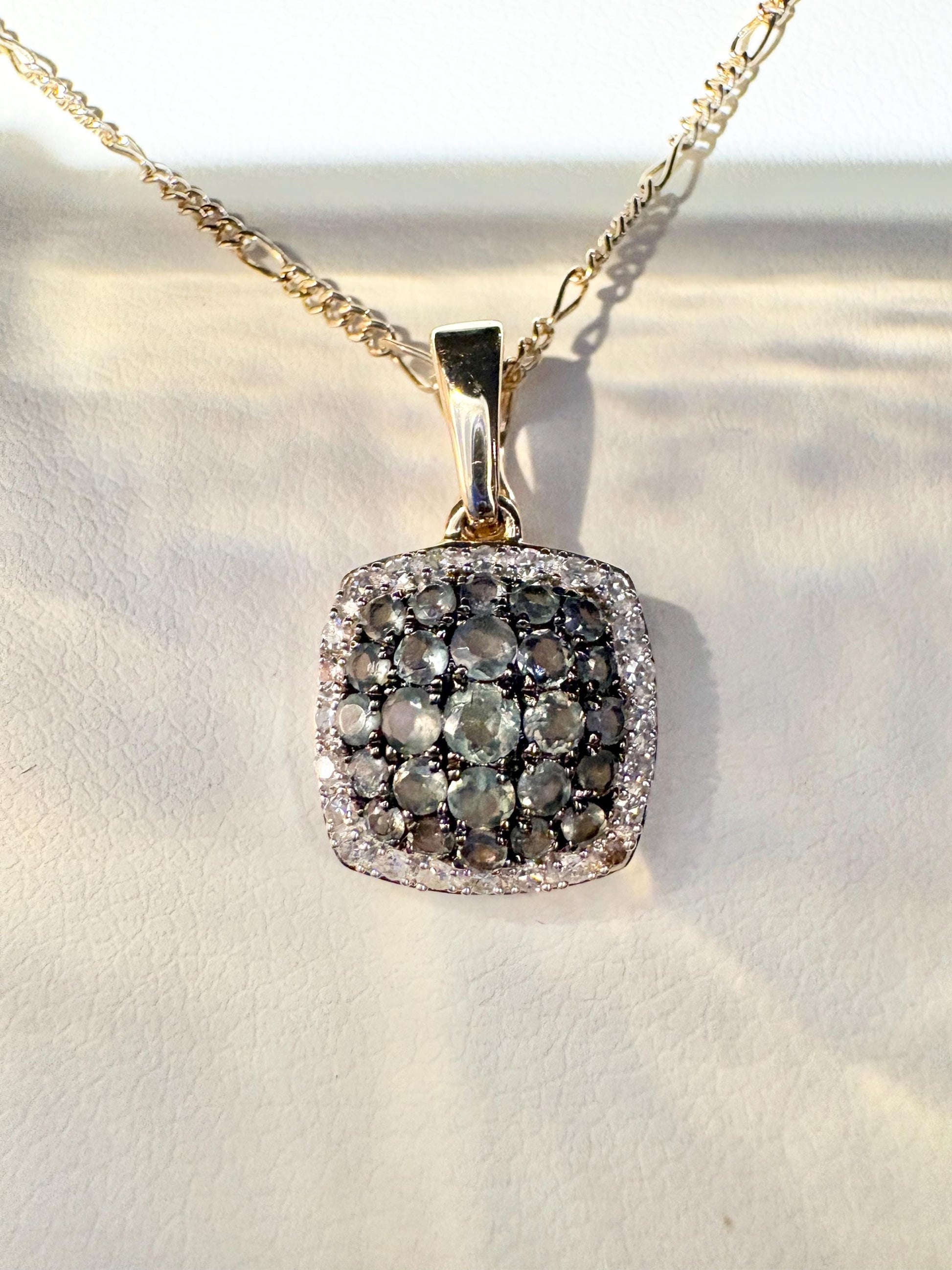 14k gold figaro necklace with a cushion cluster halo pendant of alexandrite and diamonds.