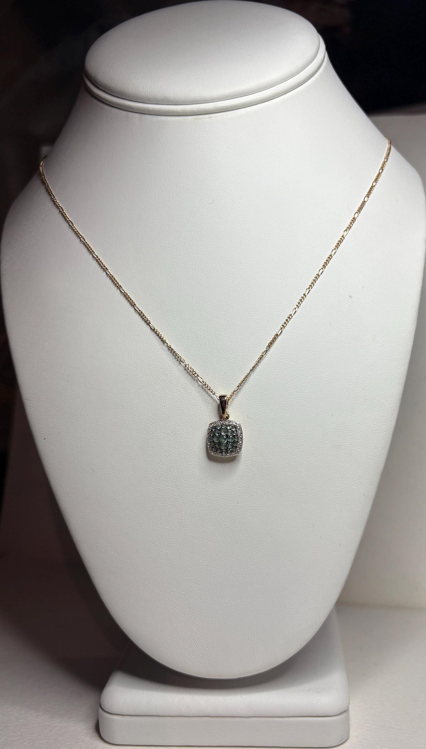 14k gold figaro necklace with a cushion cluster alexandrite and diamond halo pendant.