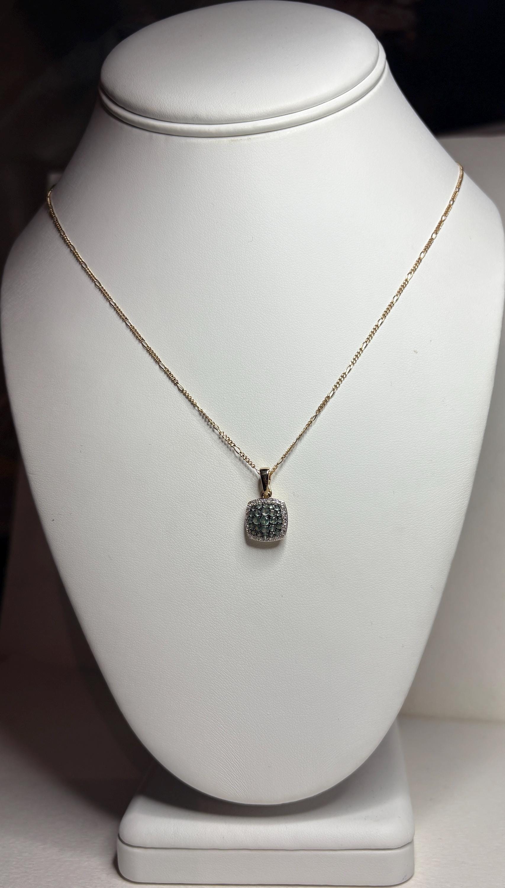 14k gold figaro necklace with a cushion cluster alexandrite and diamond halo pendant.