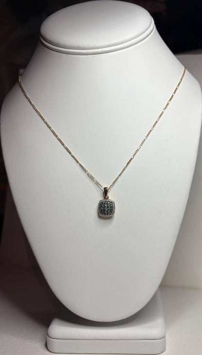 14k gold figaro necklace with a cushion cluster alexandrite and diamond halo pendant.