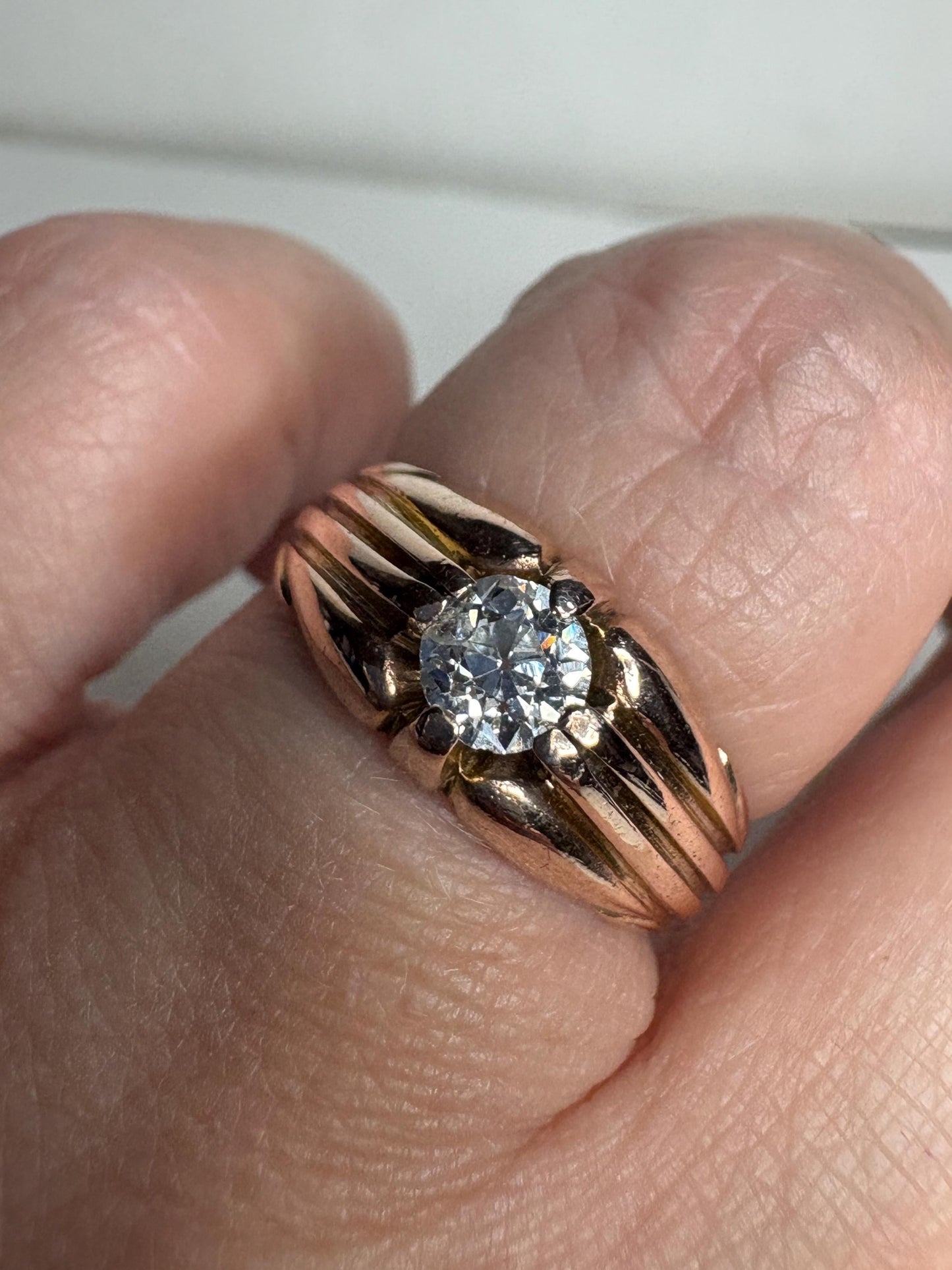 Vintage 10k rose gold ring with an old mine cut diamond.