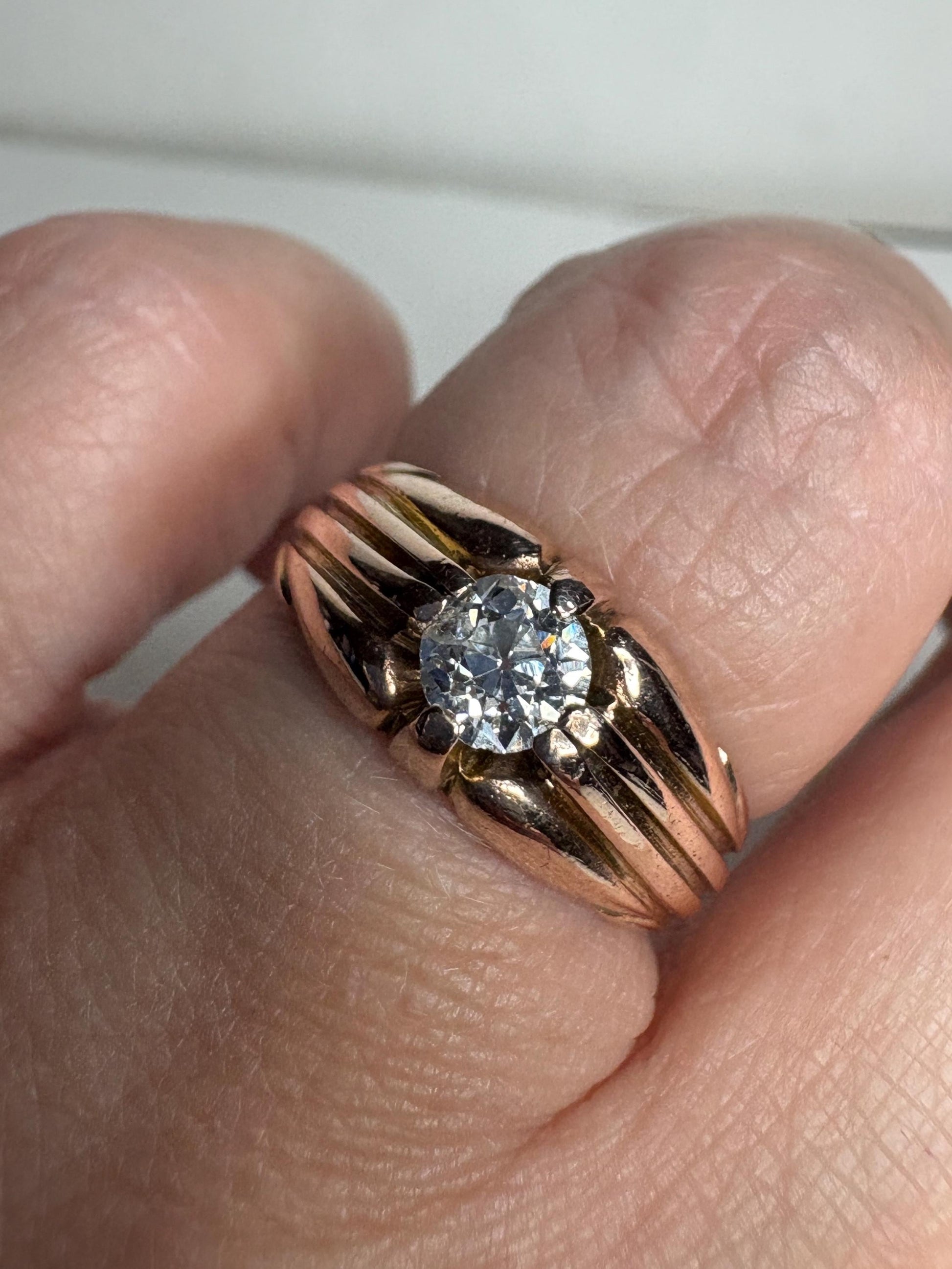 Vintage 10k rose gold ring with an old mine cut diamond.