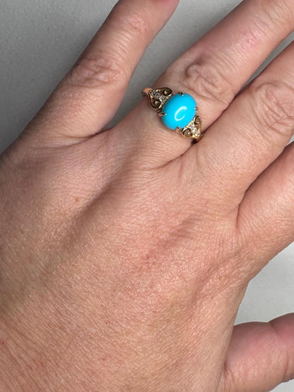 Arizona Sleeping Beauty turquoise and diamond ring in 10k gold.