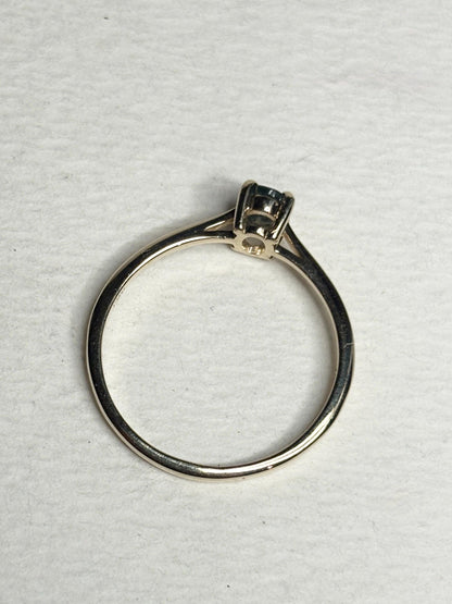 Oval alexandrite solitaire ring in solid 10k gold.