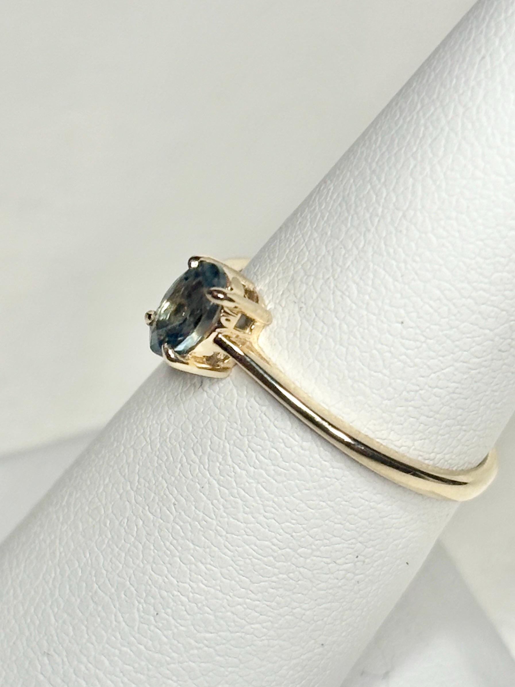 Montana sapphire solitaire oval ring in solid 10k gold.