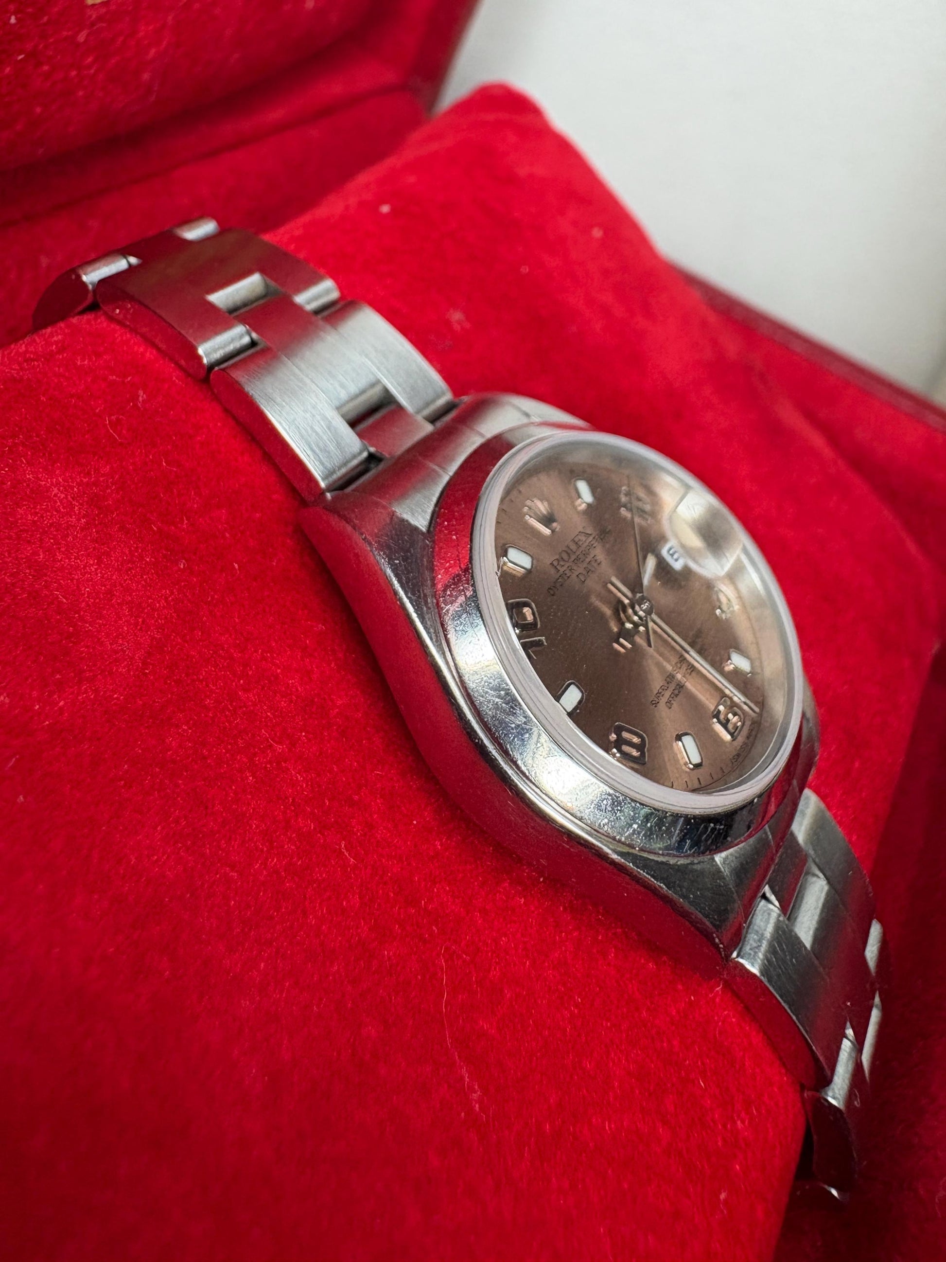 Rolex Oyster Perpetual rose Arabic date automatic wristwatch.