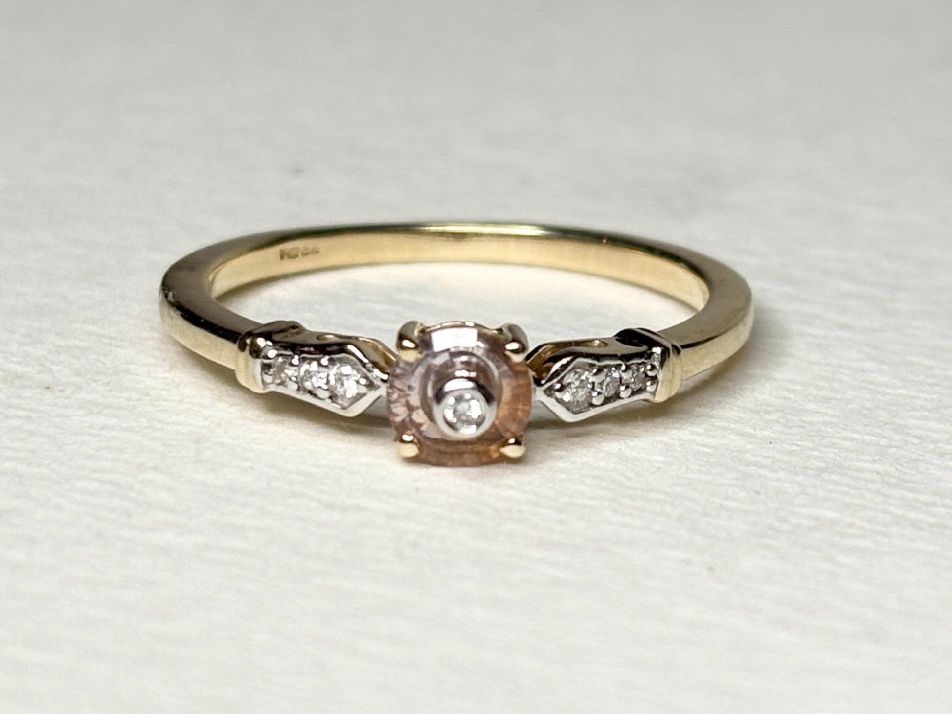 A 9k gold ring with a Montana sapphire and diamonds.