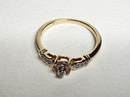 Montana Sapphire Lehrer Cut ring with diamonds in 9k gold.