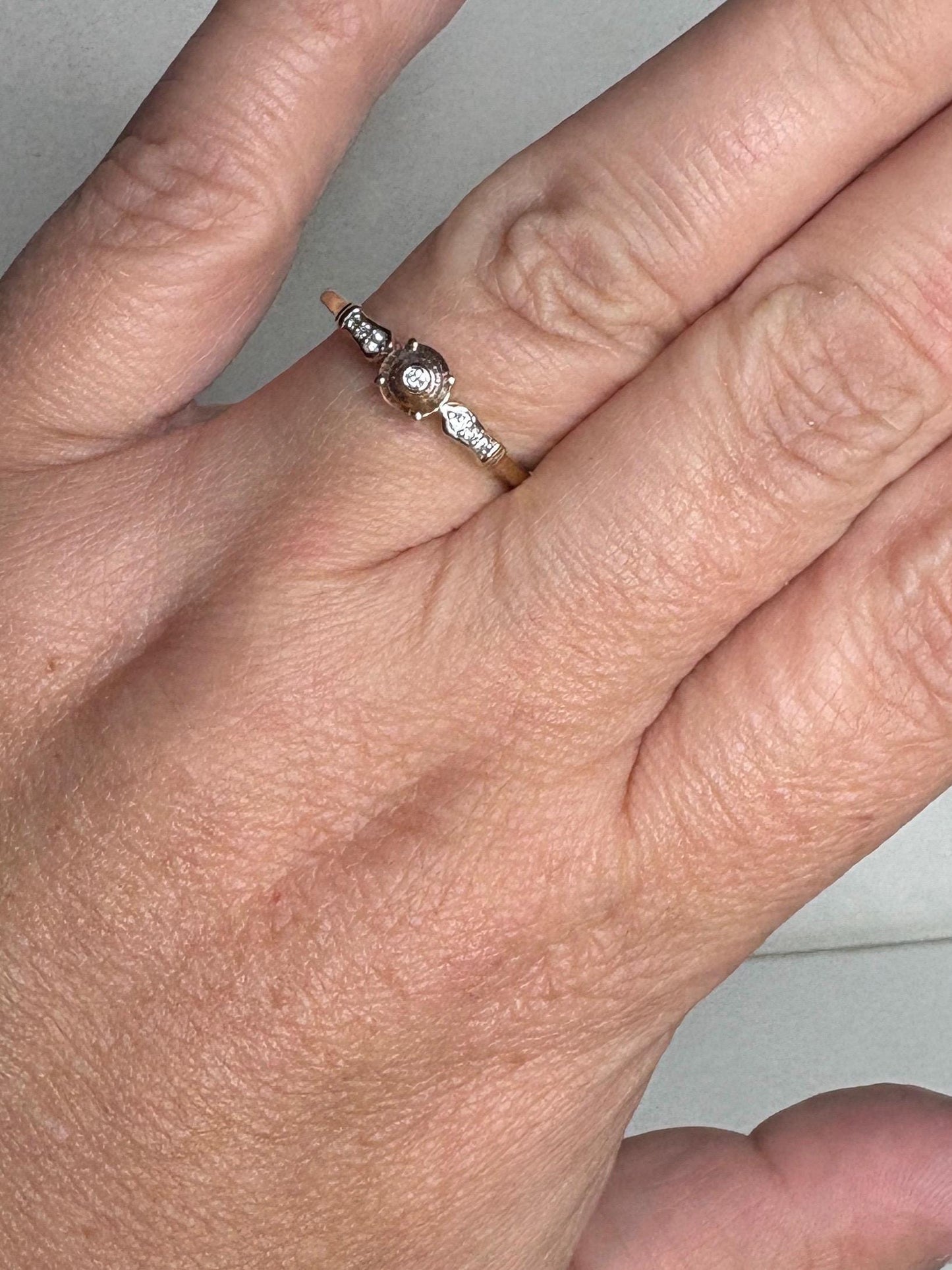 A 9k gold ring with a Montana sapphire and diamonds.