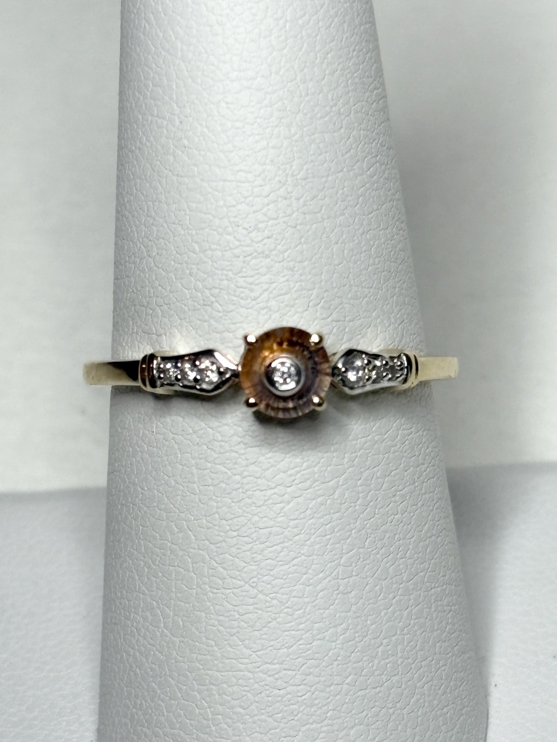 A Montana sapphire Lehrer cut ring with diamonds in 9k gold.