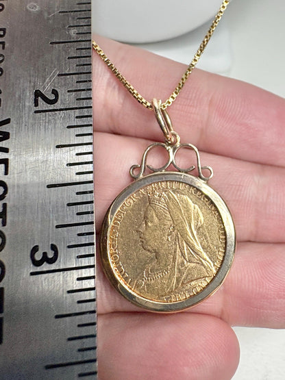 Gold coin pendant with Queen Victoria and a gold chain.
