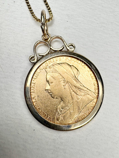 Gold coin pendant featuring Queen Victoria with a gold chain.