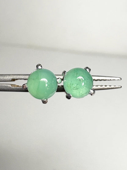 Australian chrysoprase cabochon stud earrings in sterling silver.