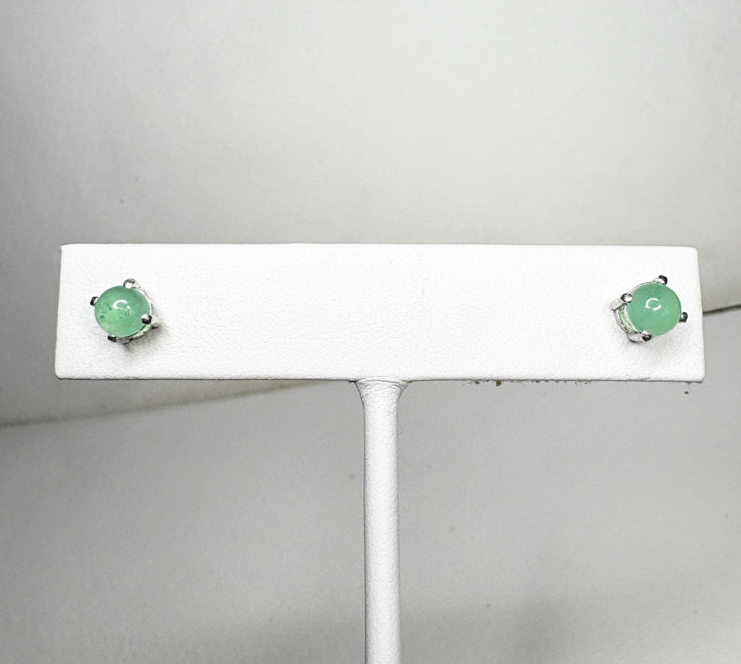 Australian chrysoprase cabochon stud earrings in sterling silver.