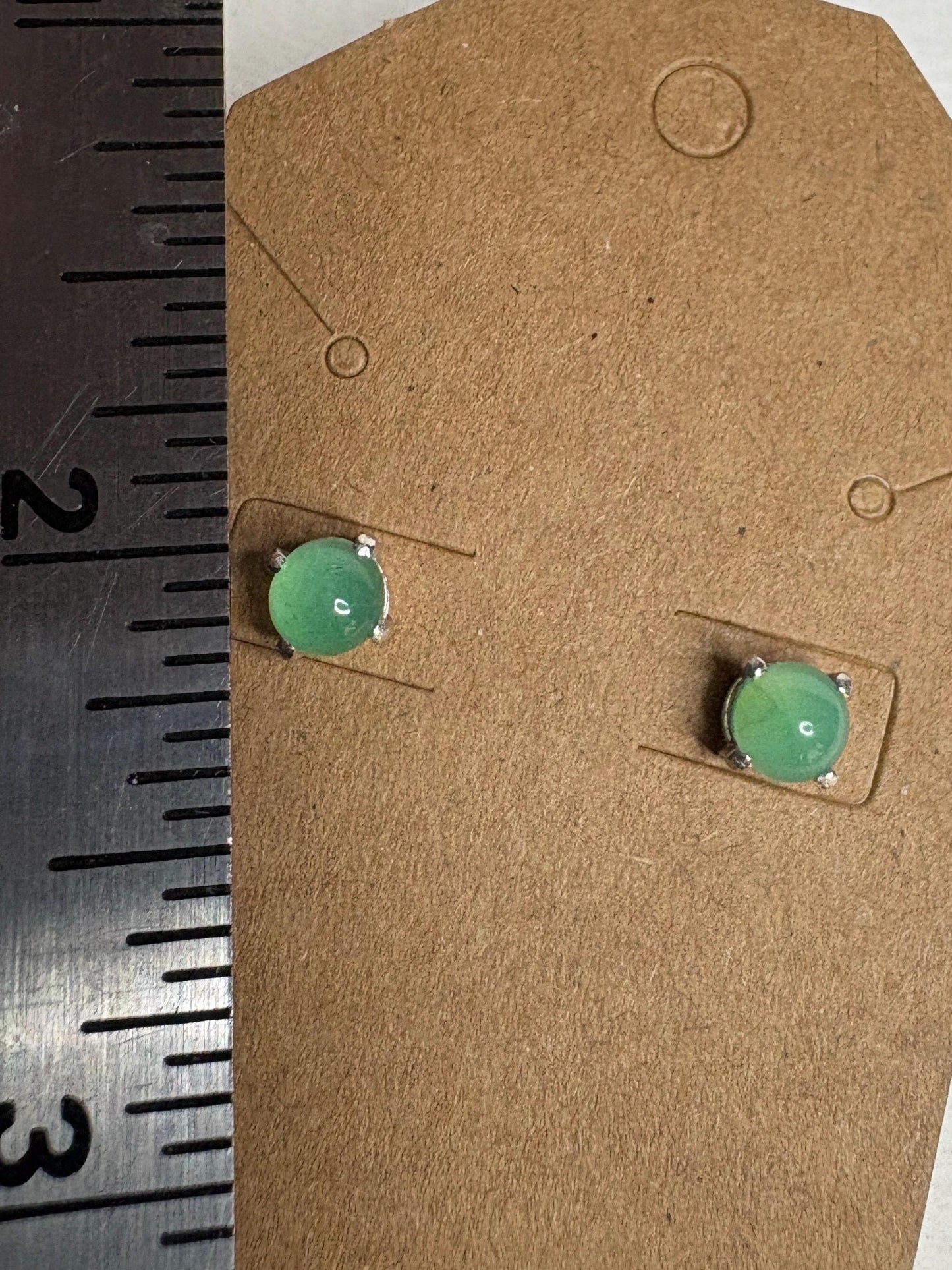 Australian chrysoprase cabochon stud earrings in sterling silver.