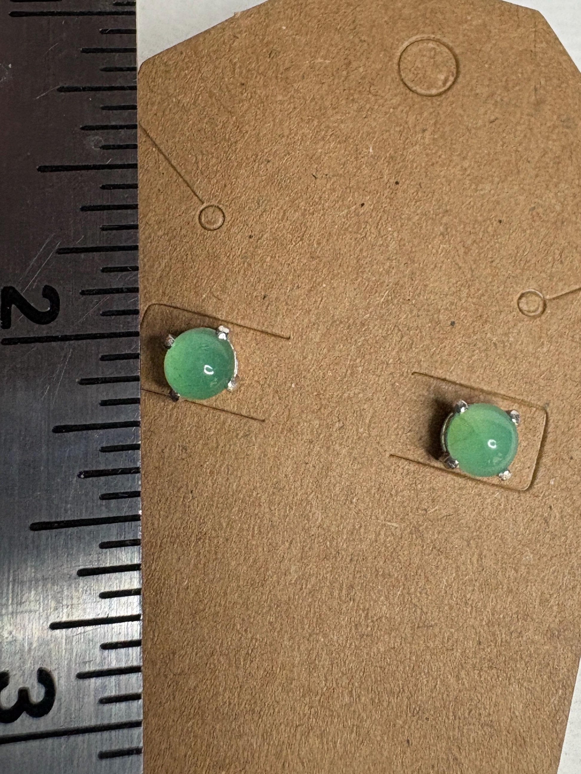 Australian chrysoprase cabochon stud earrings in sterling silver.