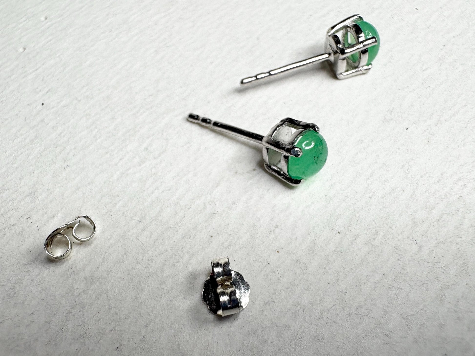 Sterling silver stud earrings with 5mm Australian chrysoprase cabochon gemstones.