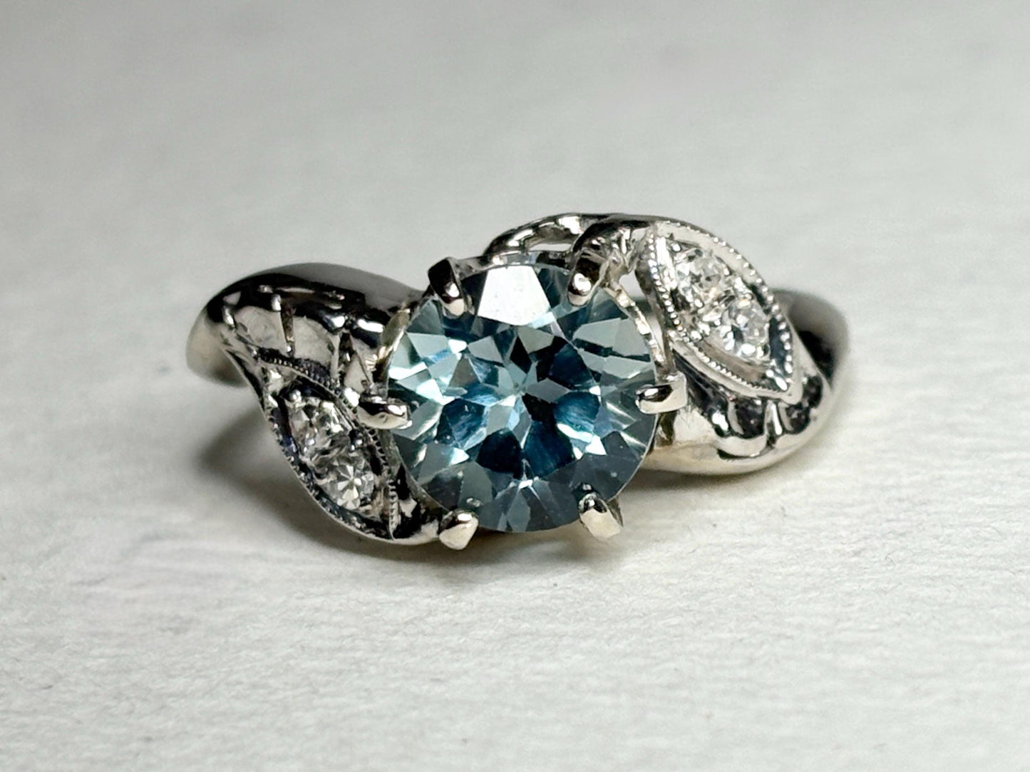 Vintage 14k white gold ring with blue topaz and diamonds.