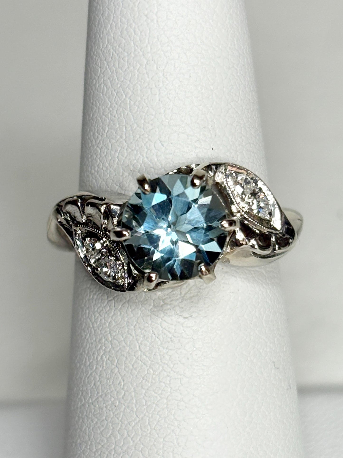 Vintage 14k white gold ring with blue topaz and diamonds.