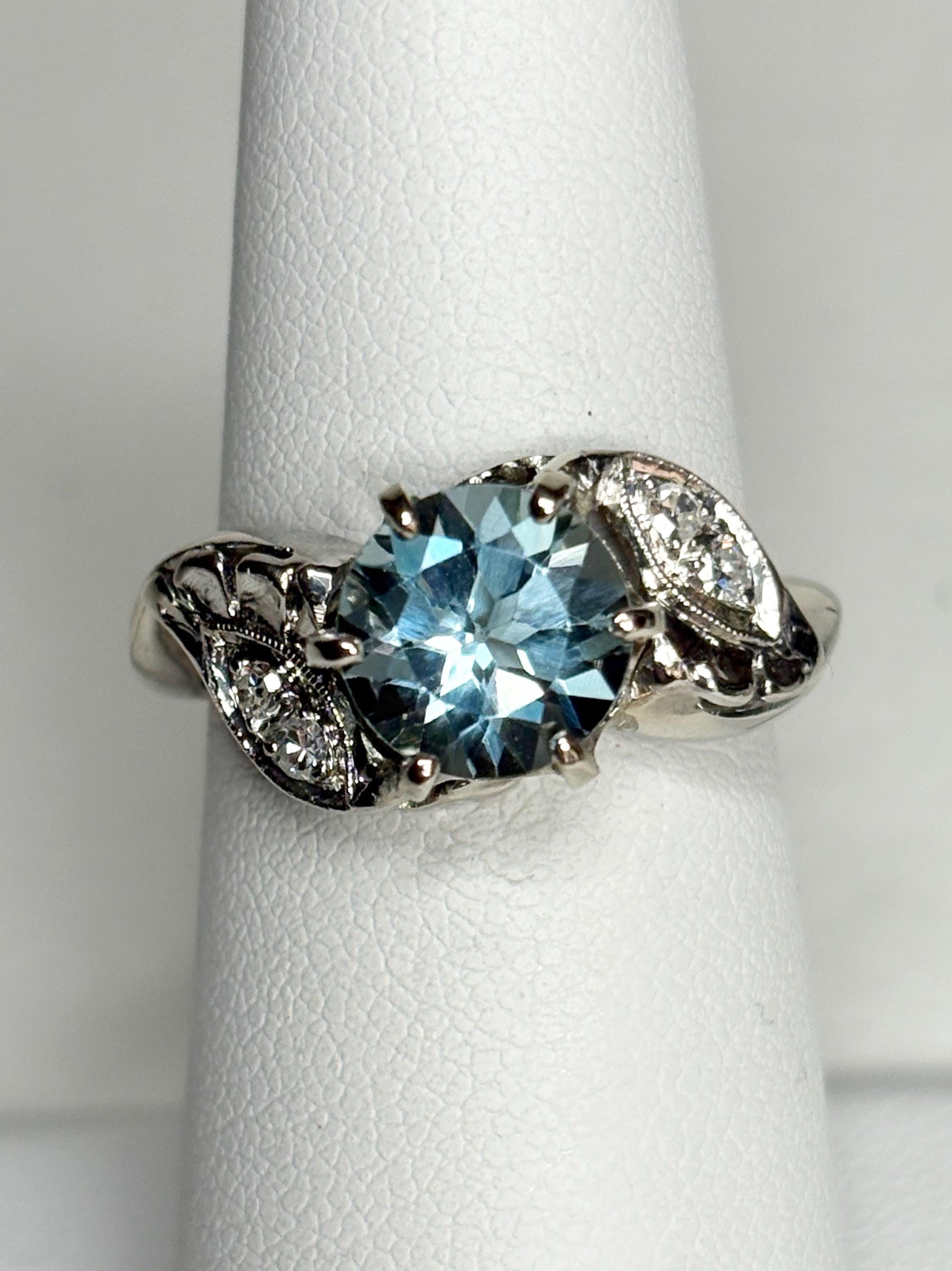 Vintage 14k white gold ring with blue topaz and diamonds.