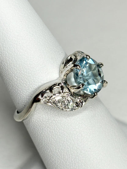 Vintage 14k white gold ring with blue topaz and diamonds.