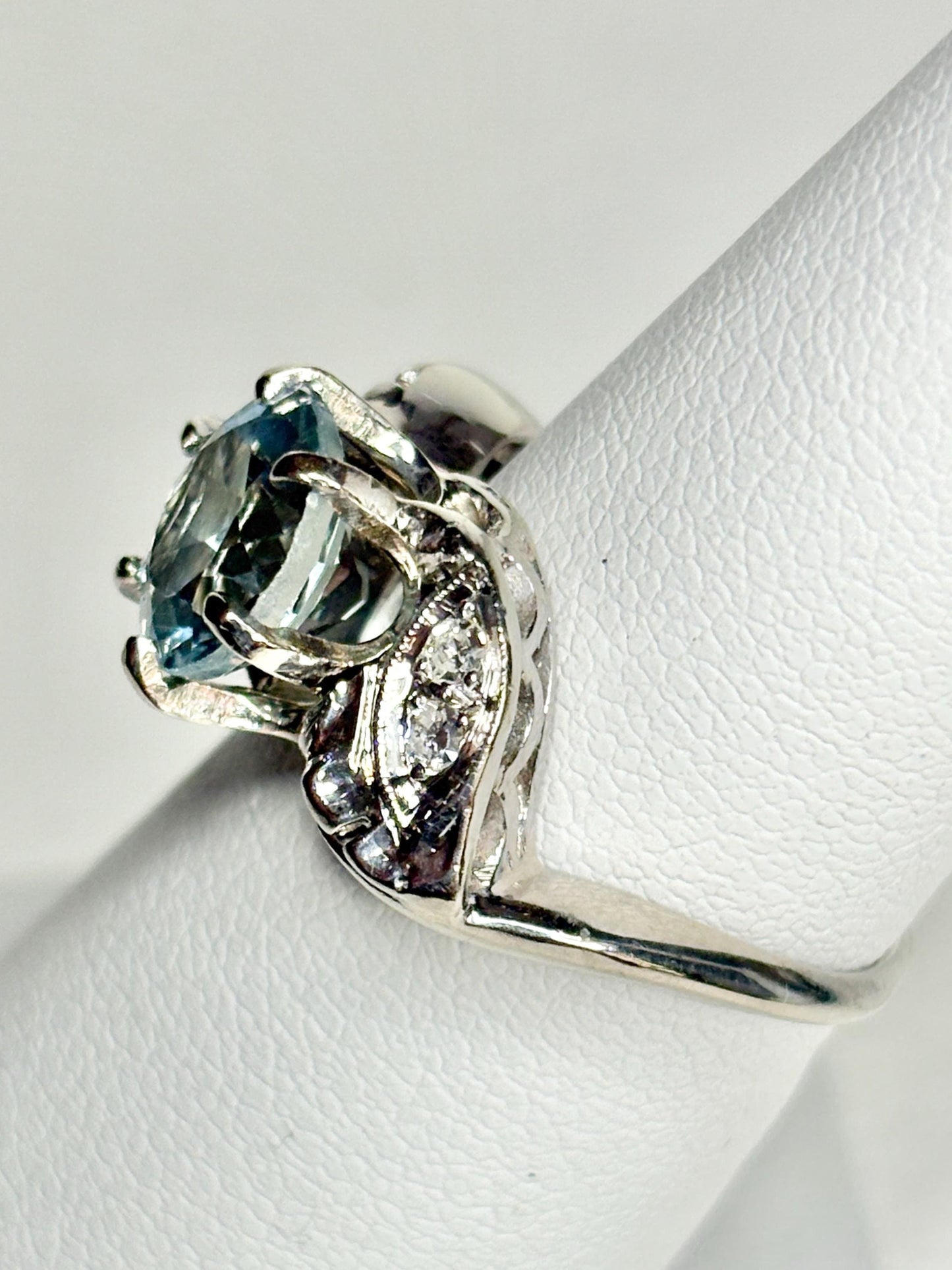 Vintage 14k white gold ring with blue topaz and diamonds.